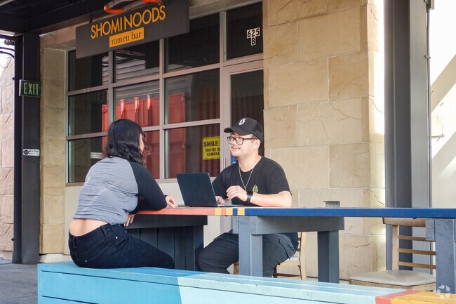 Residents warm up with rich broths at Shominoods near Mc Kinley.