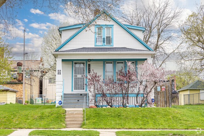 A lovely bungalow shows off it's spring color in Amani.