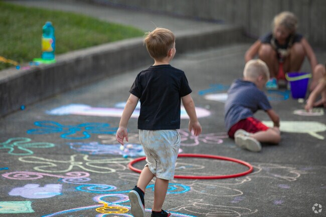 Children in Springdale are found enjoying themselves with chalk drawings.