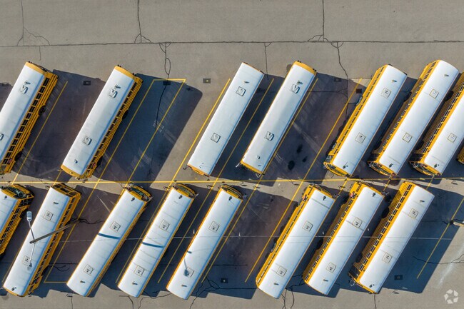 Busses assemble at Joseph G. Steenland Elementary School.