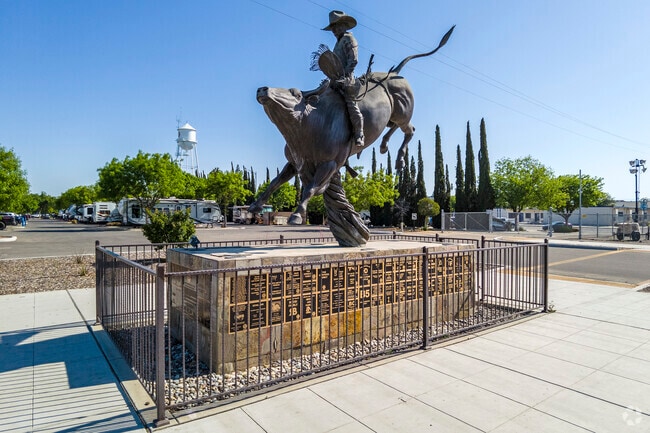 A statue of a bull rider at the Clovis Rodeo.