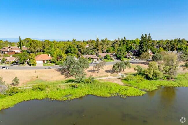 Row of homes sit peacefully across the street from Mary Lake Park.