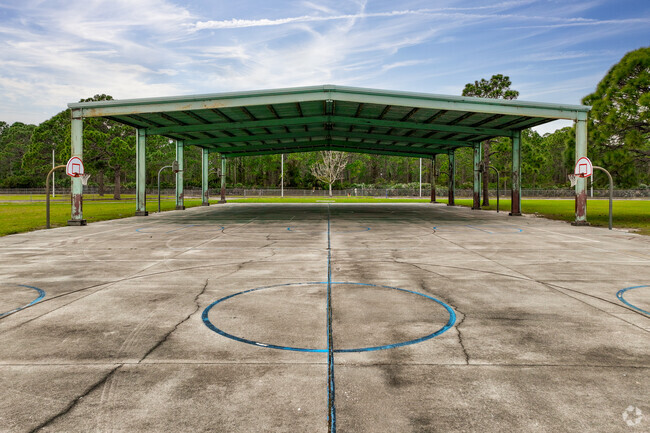 The large basketball court and covered area allow students to play outside in all weather.