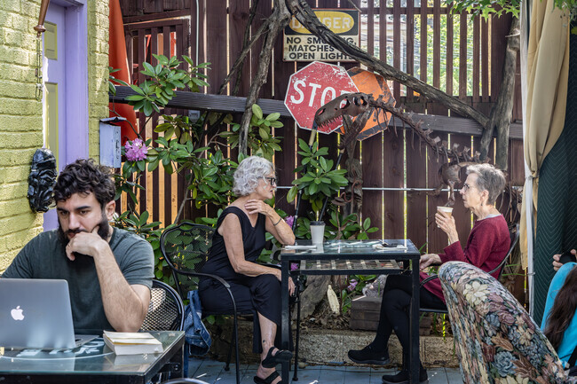 Friends meet for coffee and conversation at Biddle's Escape in Wilkinsburg.