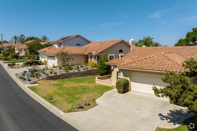 Homes sit along the Shadowridge Golf Club in the upscale neighborhood of Shadowridge.
