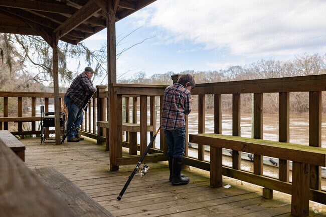 Go fishing with your children along the river in Jesup.