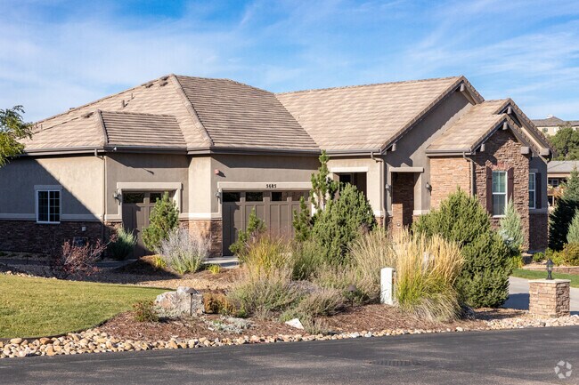 This Diamond Ridge ranch style home has a three car garage and great landscaping.