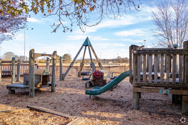 Kids love to slide down the slides at All Kids Park in Athens.