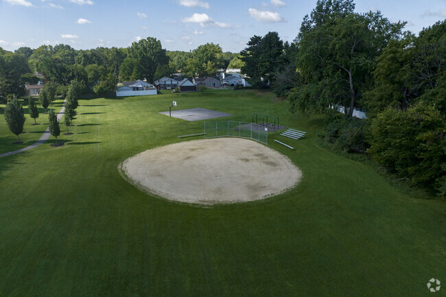 Play a game of catch at the baseball field at Radlick Park in Parma Heights.