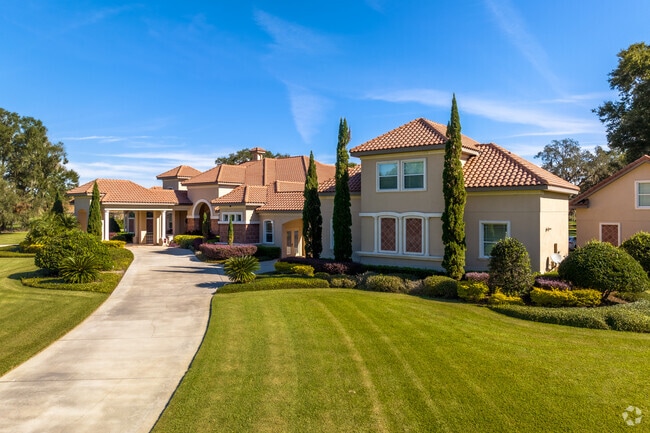 Spanish Revival homes with lush landscaping offers the mediterranean vibe to Valrico.