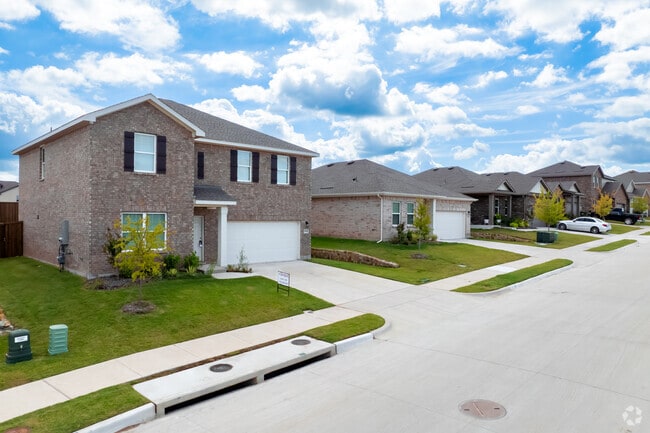 New homes line a quiet residential street in Howe.