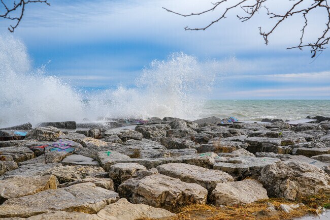 Watch the waves crash over the rocks along the lakeshore in downtown Kenosha.
