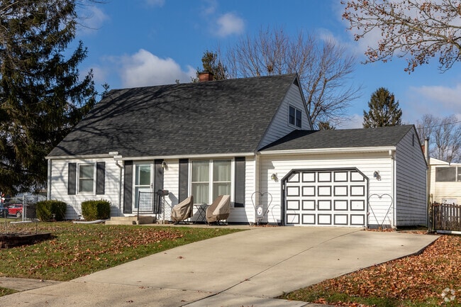 This Far South Cape Cod style home is real jewel along this street.