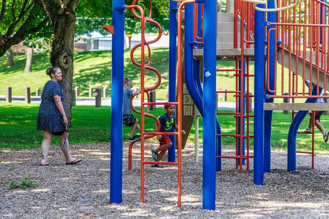 Children love to play on the playground at Shove Park in Fairmount.
