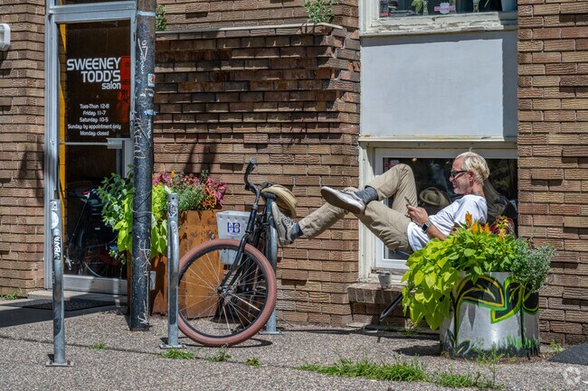 Lowry Hill East residents bike to Sweeney Todd's Salon for a fresh look.