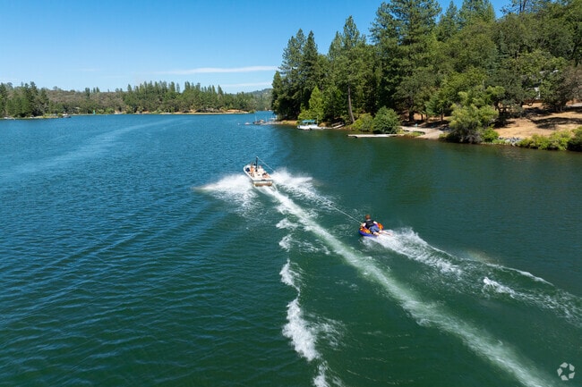 Water sports like tubing, paddleboarding, and kayaking are common on Lake Combie.
