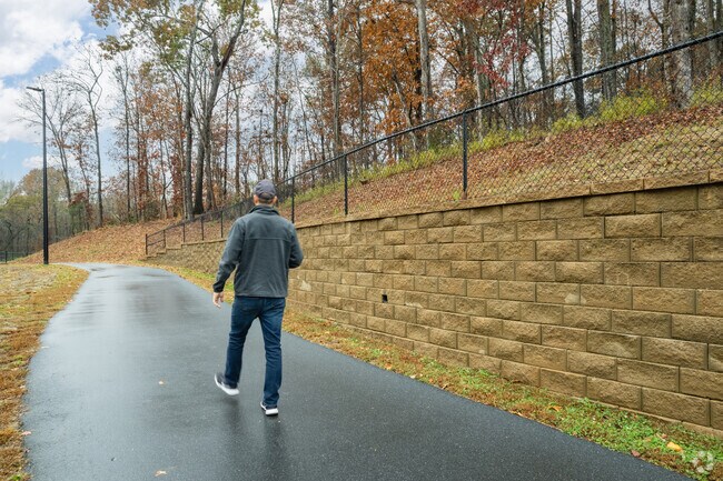 Locals enjoy taking a morning walk at the River Park Trail in Catawba.