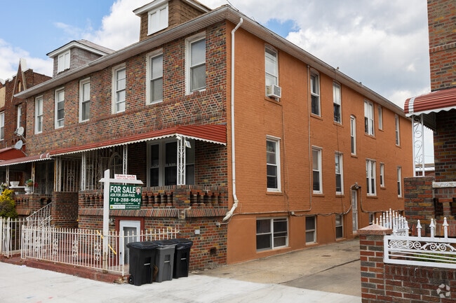 Nine-bedroom attached brick condos from 1920 can be found for around $1 million in Flatbush.