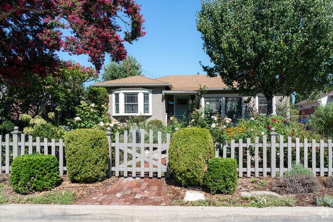 Yards in Mayflower Village range from simple lawns to picket fenced rose gardens.