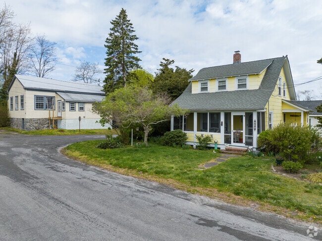 Lovely Cape Cod-style homes tucked away in Nassau Point.