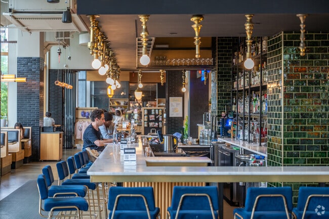 The Roost is a restaurant in Hill East styled like a cafeteria with different food stations.