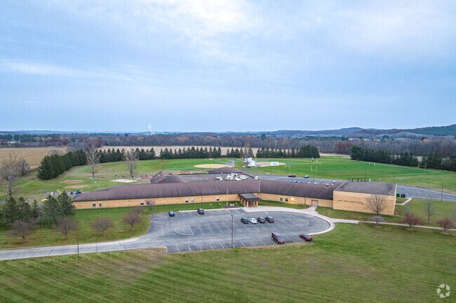 Tiffany Creek Elementary is a large school with an open green space on campus.
