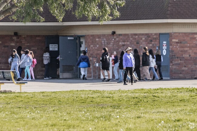 Faculty keep their students safe at Courreges Elementary in Fountain Valley.
