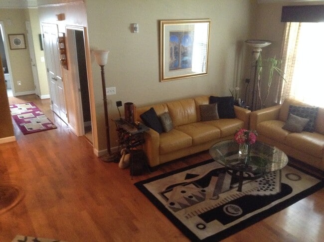 Living room with loft above left