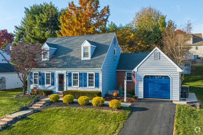 A well manicured Cape Cod with dormer windows in Sprigetts Manor-Yorklyn.