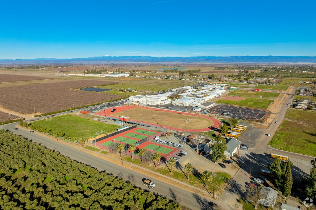 Corning Union High School is surrounded by orchards and fields.