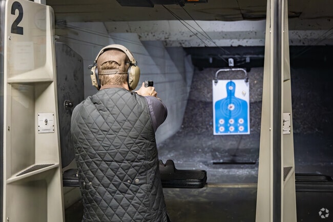Residents practicing their marksmanship at A & S Indoor Pistol Range in Youngwood.