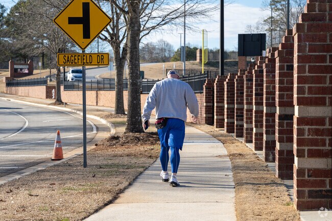 Many local residents of Buford use the paved walking trails found throughout town.
