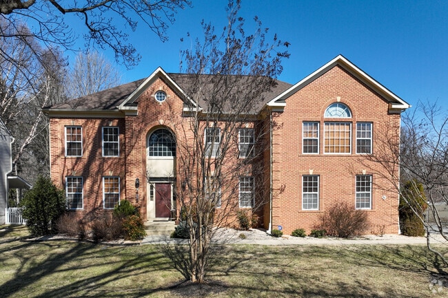 Inviting brick colonial home near Leisure World.