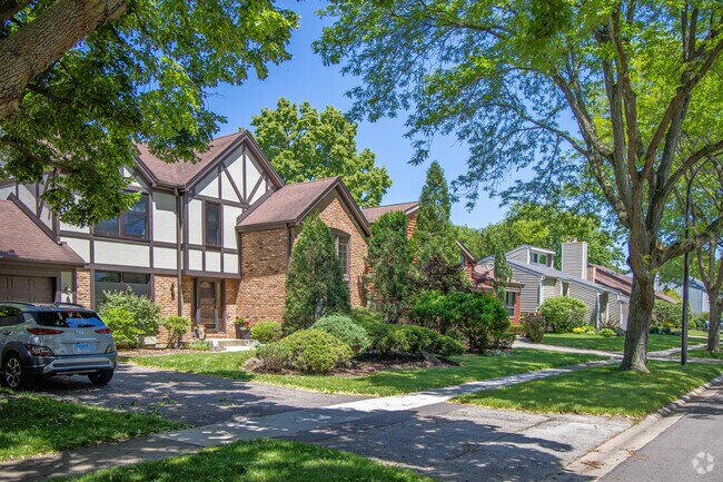 Mature trees provide shade for West 83rd residents.