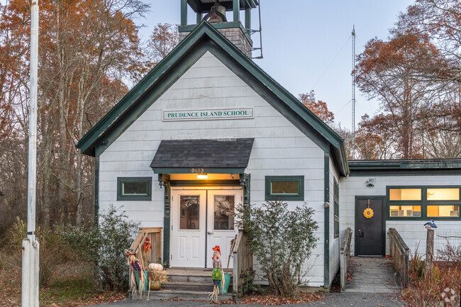 Teachers and volunteers are active mentors to students at Prudence Island School.