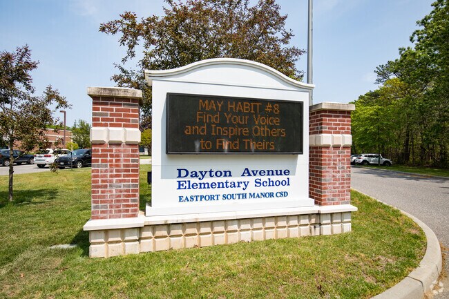 The Eastport Elementary School front signage displays the morning announcements.