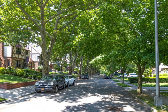 Lush trees line many streets in Douglaston creating a homey feeling.