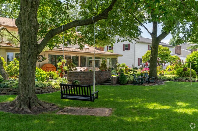 Whitfield residents meticulously care for their yards, often adding swings and paitos.