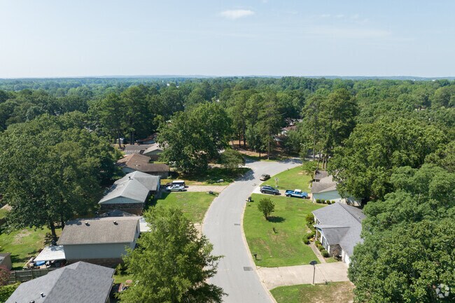 Bryant subdivisions feature wide, paved driveways.