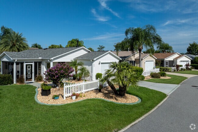 Village of Tall Trees villa homes are set on well manicured lots.