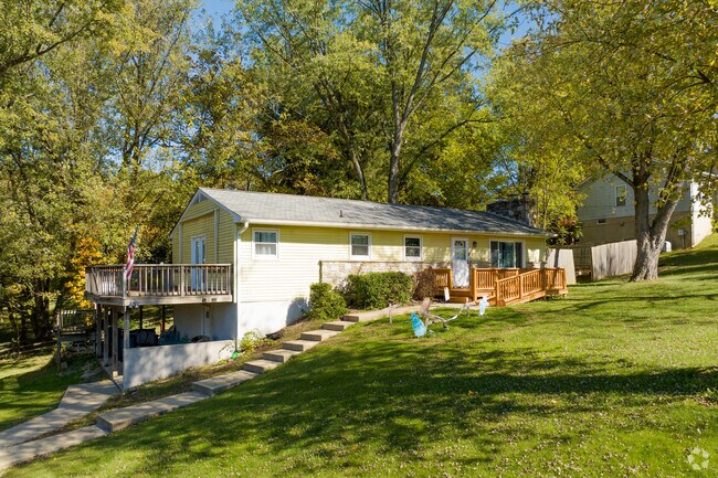 Homes are nestled into the rolling hillsides of Susquehanna Trails, offering scenic views.