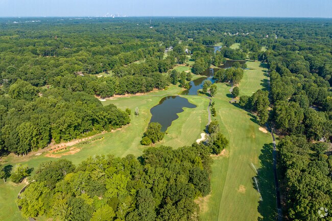 Locals enjoy the 18 holes at the Pine Lake Country Club in Mint Hill.