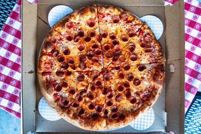 Savory slices of pizza and Italian inspired sandwiches are available at Little Pops NY Pizzeria.