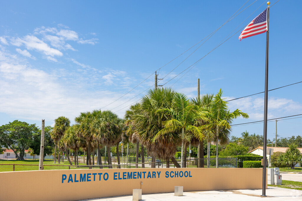 Palmetto Elementary School signage with flag.