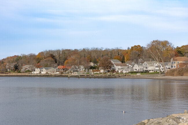 A row of waterfront homes in the Bristol Highlands neighborhood includes one with a dock.
