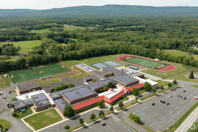 Pine Bush High School earns a B from Niche and is above average in teachers and diversity.