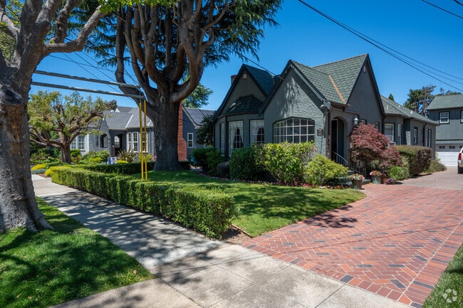 A-lined roof house in Burlingame Gardens offers charming architecture and cozy living.