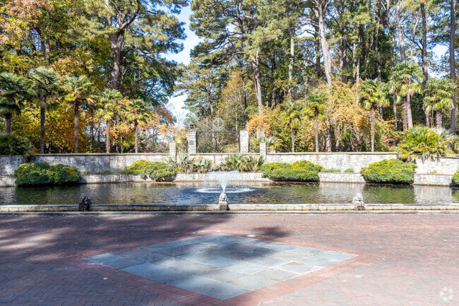 Camellia Shores families relax at Norfolk Botanical Gardens with lakes and floral displays.