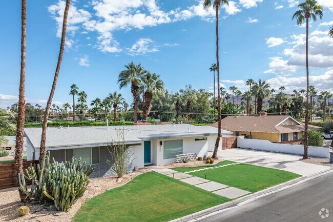 A row of homes with a mix of traditional and modern styles located in Tahquitz River Estates.