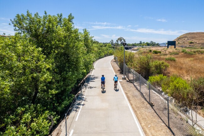 Bikers enjoy the San Diego Creek Trail in Irvine Spectrum.